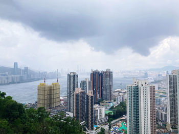 Modern buildings in city against sky