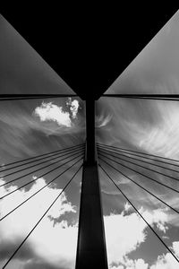 Low angle view of building against cloudy sky