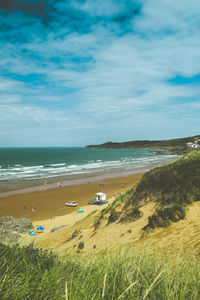 Scenic view of beach against sky