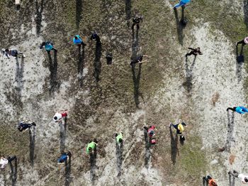 High angle view of people on field