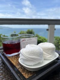 Close-up of bottle on window
