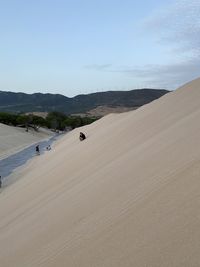 Scenic view of desert against sky