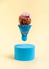 Close-up of ice cream against pink background