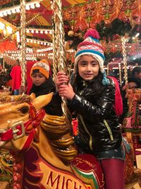 Portrait of young woman in amusement park