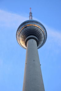 Low angle view of lighthouse against clear blue sky