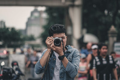 Man photographing with camera