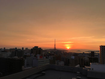 View of cityscape at sunset