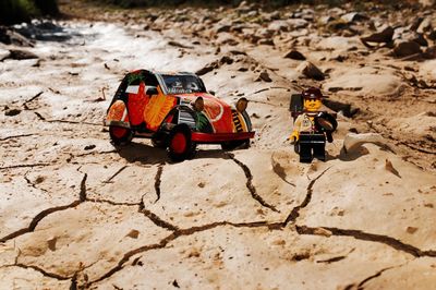 High angle view of toy car on sand
