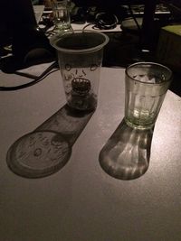 Close-up of glasses on table