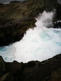 Scenic view of rocks in sea