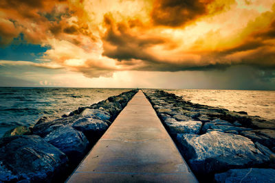 Scenic view of sea against sky during sunset