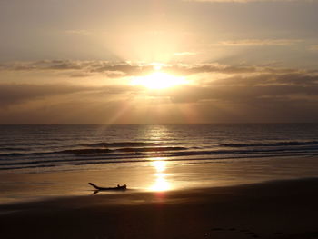 Scenic view of sea at sunset