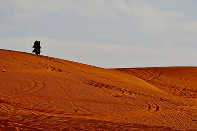 Scenic view of desert against sky