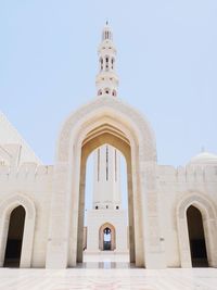 Low angle view of mosque against clear sky