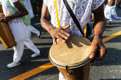 Percussion musical group is seen performing during fuzue, pre-carnival