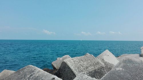 Calm blue sea against the sky