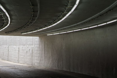 View of empty illuminated tunnel