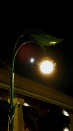 Low angle view of illuminated lights