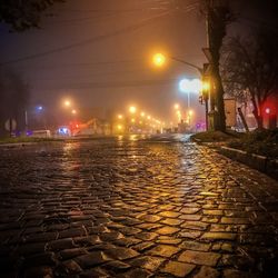 Illuminated street at night