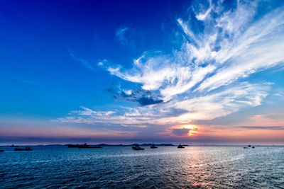 Scenic view of sea against sky at sunset