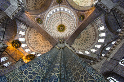 Low angle view of ornate ceiling of building