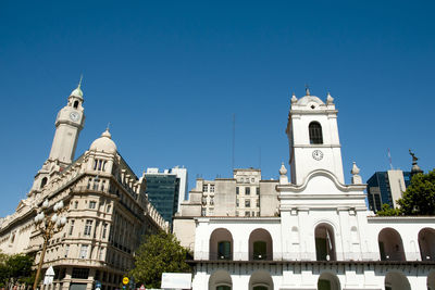 Low angle view of building against blue sky