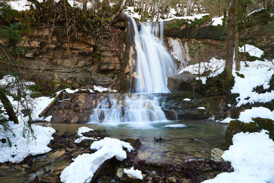 View of waterfall in forest