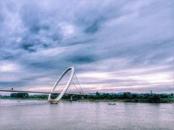 Scenic view of bridge over river against sky