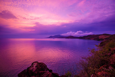Scenic view of sea against sky at sunset