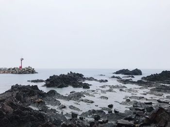 Scenic view of sea against clear sky