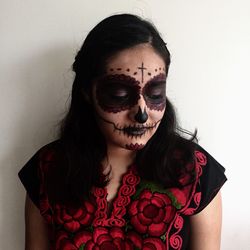 Close-up of woman with face paint during halloween