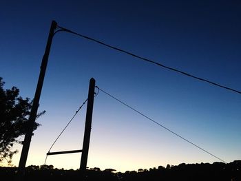 Low angle view of silhouette plants against clear sky