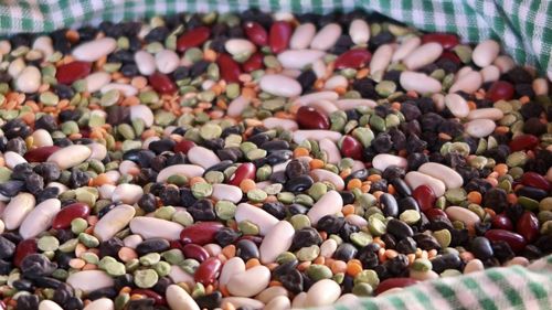 Full frame shot of different colourful beans in a basket