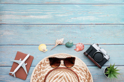 High angle view of sunglasses on beach