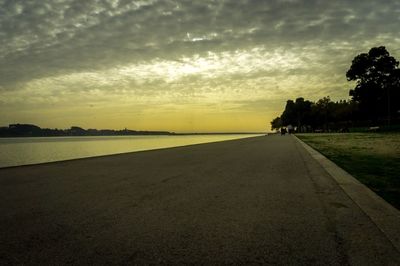 Scenic view of beach against sky during sunset