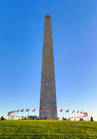 Low angle view of monument against clear blue sky