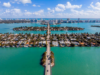 High angle view of harbor by sea against sky