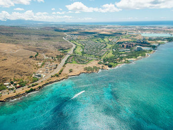 High angle view of sea shore against sky