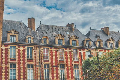 Low angle view of residential building against sky