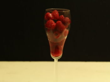 Close-up of drink against black background