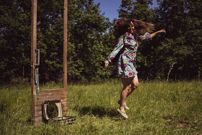 Full length of woman running in park