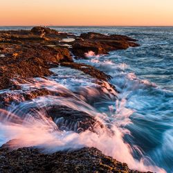 Scenic view of sea against clear sky