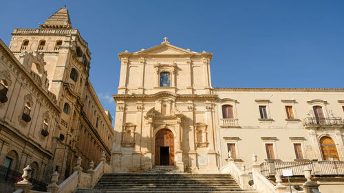 Low angle view of historic building against clear sky