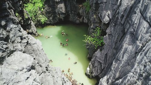 High angle view of rocks by river