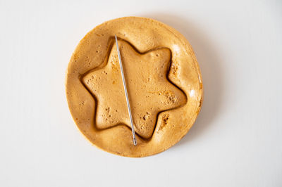 High angle view of cookies on white background