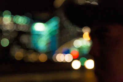 Defocused image of illuminated lights at night