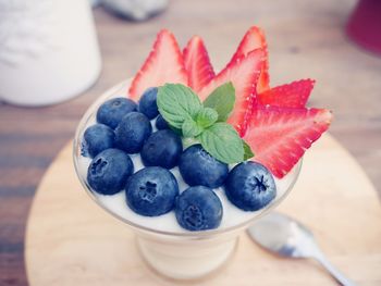 Close-up of strawberries in plate on table