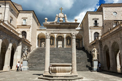 Statue of building against sky