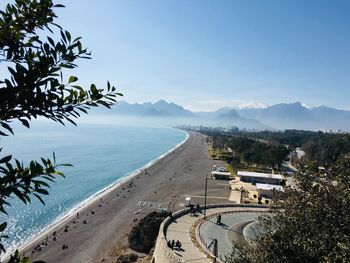 High angle view of swimming pool by sea against sky