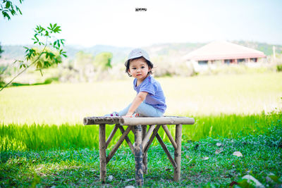 Portrait of girl on field